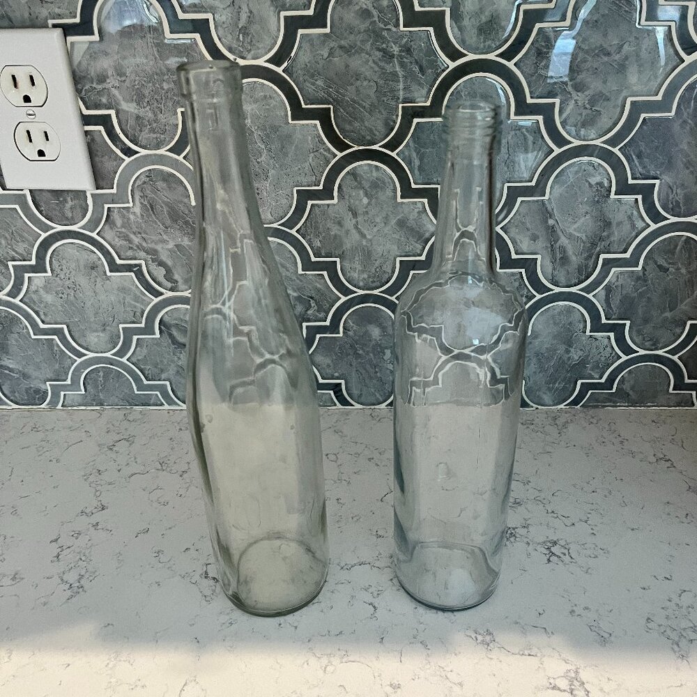 2 Decorative Glass Wine Bottles